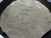 Take large tortilla with diameter about 30 cm,...