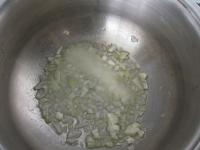 Peel the onion, finely chop and saute in oil. Add...