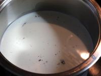 Heat the milk in a saucepan, add vanilla from...