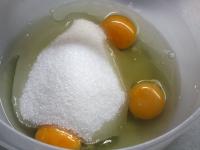 In a bowl whisk the eggs with sugar....