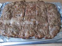 Remove the meatloaf from the baking sheet and cut....