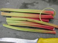 Peel the rhubarb stalks, wash and cut into small...