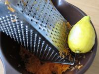 Wash the lemon well, grate some of its peel to the...