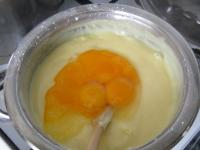 Separate egg yolks from whites. Mix milk with...