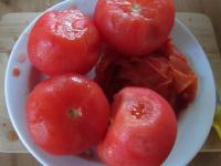 Pour boiling water over the tomatoes, strain the...