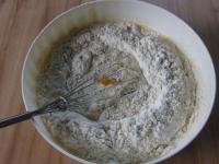 Mix a liquid mixture from milk, flour, eggs and...