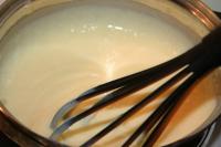 Cook thick vanilla custard....