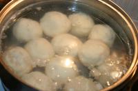 Strain the dumplings, rinse them under cold water...