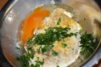 Soak white bread rolls in warm milk, squeeze them...