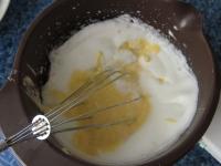 Stir egg yolks mixture into egg whites foam....