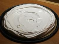 Spread a layer of meringue to fit circle on...