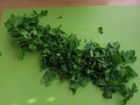 Wash parsley leaves and chop. ...