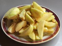 Peel apples, cut them into quarters, core them and...