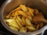 Cook apples while stirring frequently for about 10...