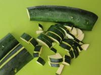 Wash zucchini, cut the endings and chop into small...