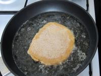 Heat the oil in a pan. Fry the cheese from one...