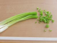 Cut spring onion into thin strips and then chop...