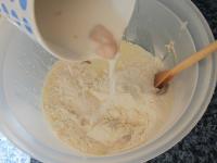 Crumble yeast in the warm milk, add a little sugar...