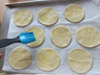 Place the rounds on baking tin with lined...