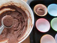 Place thick dough into the muffin tin with paper...