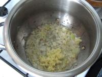 Clean the onion, cut it finely and fry it in fat....