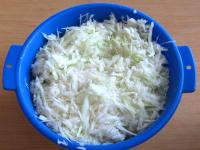 Finely slice a cabbage. Put it in a colander....