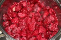 Put raspberries with sugar in a small pot. Cook to...