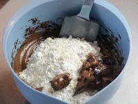 Stir in the flour with baking powder and ground...