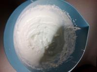 Beat whipped cream with sugar......