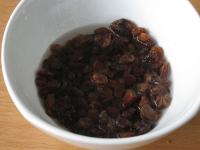 Wash the raisins and pour in the rum till the top....