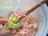 Push meat-rice mixture in the peppers....