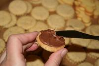 Stick together baked rounds with nutty cream...