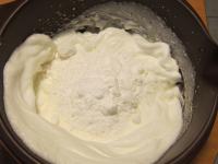 Beat the egg whites until stiff and beat in sugar....