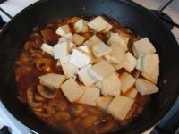 ...and add to the mushrooms. Mix gently and let it...