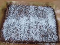 Sprinkle the surface with grated coconut and press...