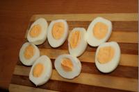 Hard boil the eggs (boiling for about 8-10...