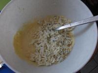 Roughly grate the cheese and mix into the yolks....