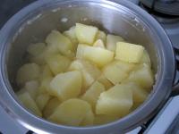 While the cheese is freezing, peel the potatoes...