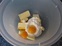 Put in a bowl softened butter, egg yolks and...