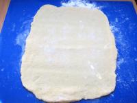 Use a rolling pin to spread one half of the dough...