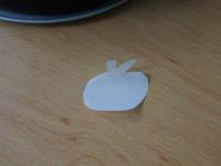 Draw the apple on the baking paper, fold the paper...