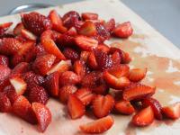 Cut strawberries into smaller pieces....