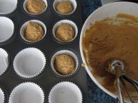 Using an ice cream scoop, divide the dough into...