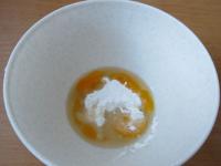 Blend egg yolks with sugar and rum. Beat the egg...