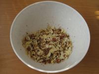 Chop hazelnuts and walnuts and mix them with...