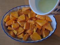 Put the pumpkin in a baking pan and pour over the...