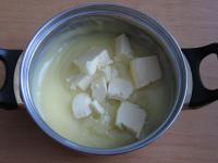 Cook a thick custard from milk, sugar and vanilla...