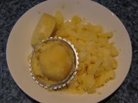 Peel cooked potatoes and cut into the rings,...