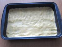 Place the dough into the tray (20x30 cm) and...