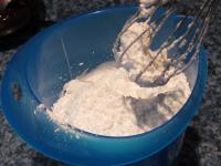 Beat the sugar into egg white foam......